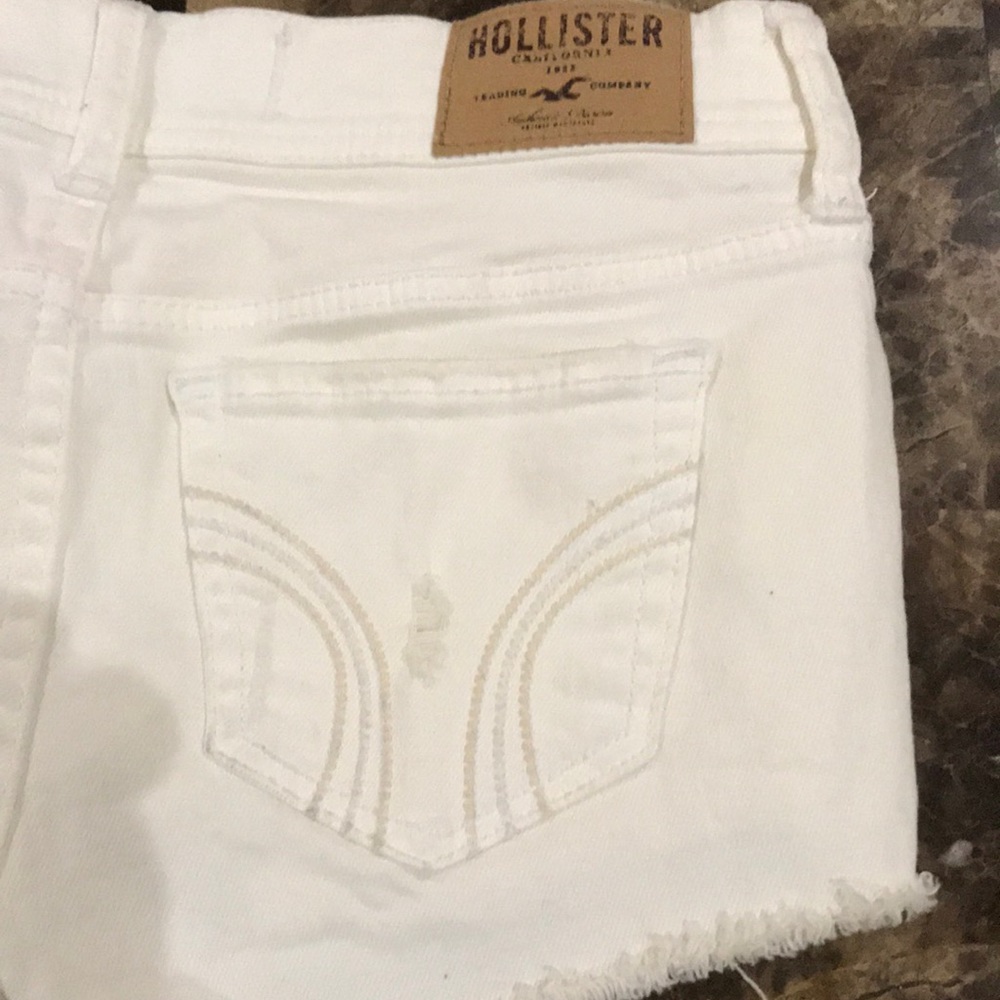 Short white with ripped under bags and back bags! - Picture 3 of 5